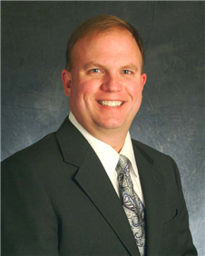 John E. Sharpe, SIOR, CCIM
