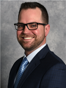 Travis  Tiede, SIOR